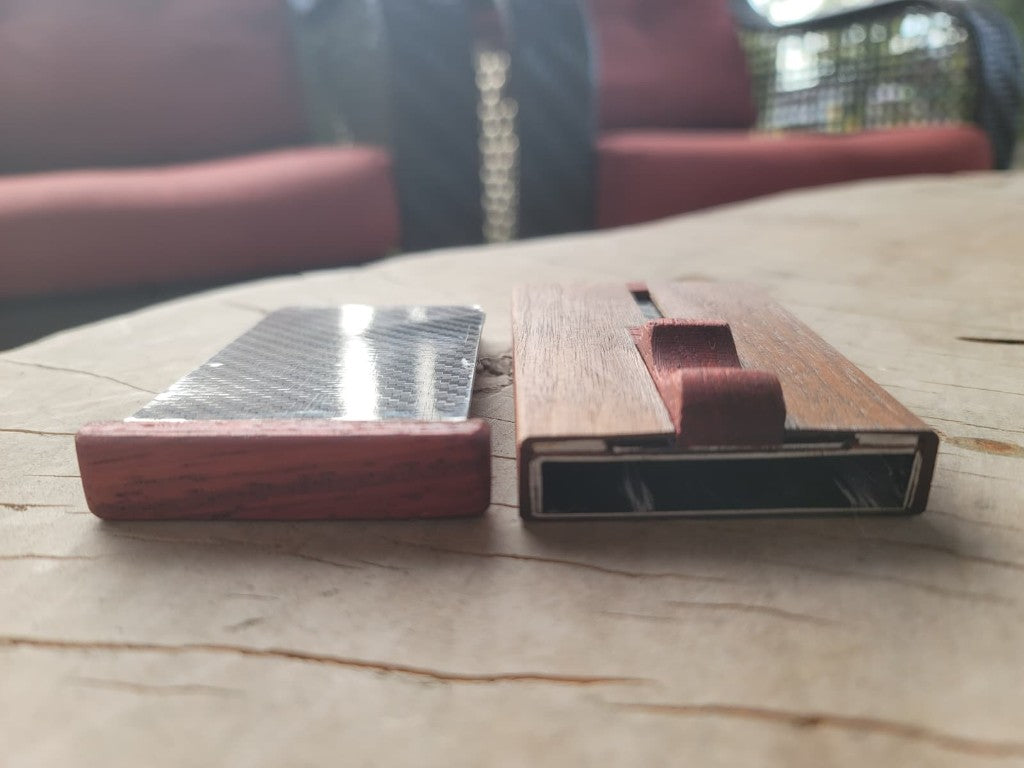 Front view of the North 44 shell opening beside the carbon-fiber card tray