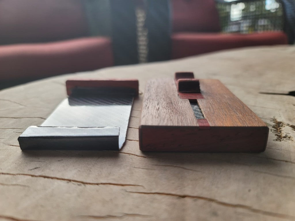 Side view of the North 44 wooden shell and carbon-fiber card tray